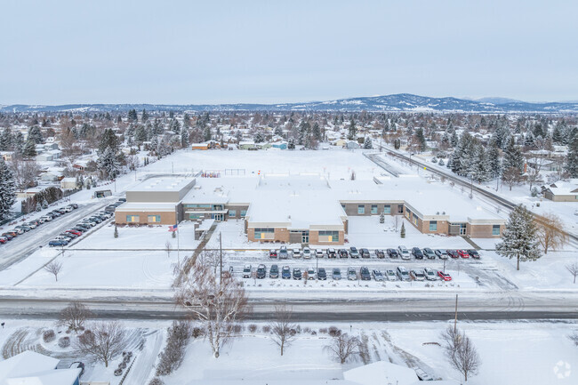 Sunrise Elementary has a small parking lot in front of the school for visitors and staff.