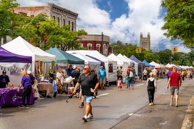 Artists display their handmade crafts at the Howell Melon Festival.