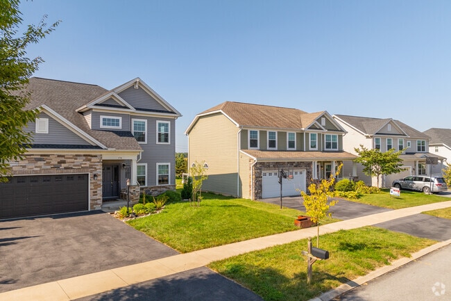 Rows of homes in Ferguson Township sit close together with sizable yards behind.