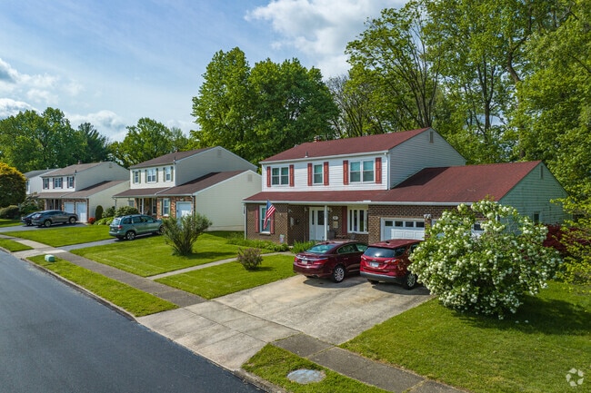 You'll find Colonial homes throughout Brookhaven, most with attached garages and large yards.