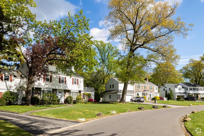 A row of various single-family homes in Lake Success, New York.