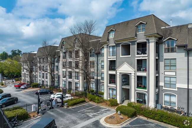 Several different condominium complexes line Lenox Road in the Pine Hills neighborhood.