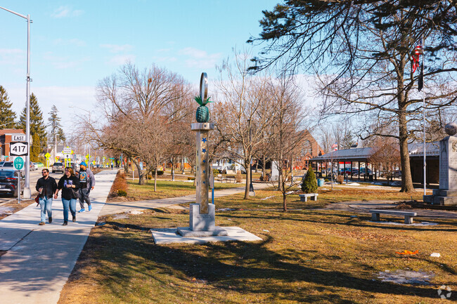 Across from the Olean municipal building is a park with art sculptures and a gazebo.
