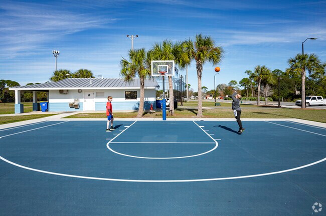 Shoot some hoops with friends on the full length basketball court at Whistle Stop Park.