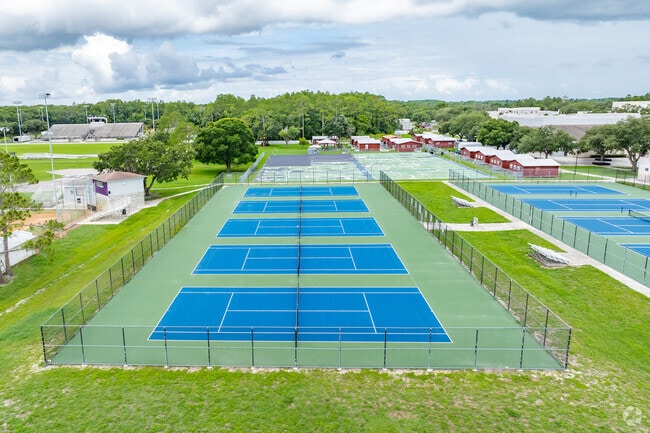 Students enjoy outdoor play on the sports courts at River Ridge High School.