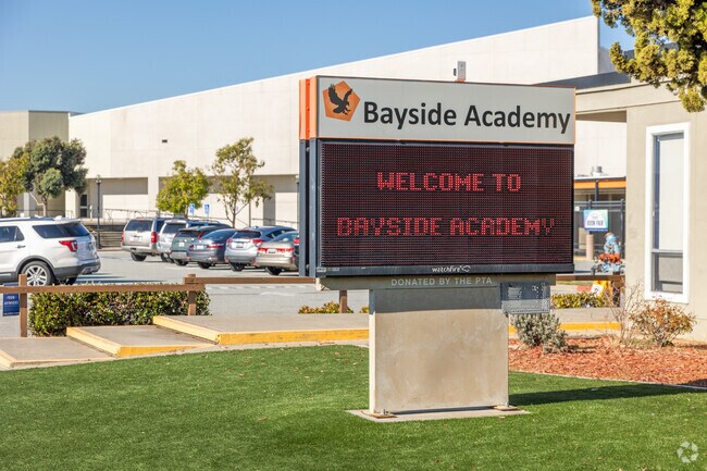 The digital sign at Bayside Academy highlights events and school updates.