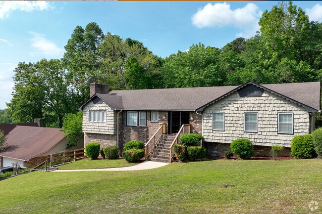 Well-manicured lawns are a frequent sight in the Huffman neighborhood.