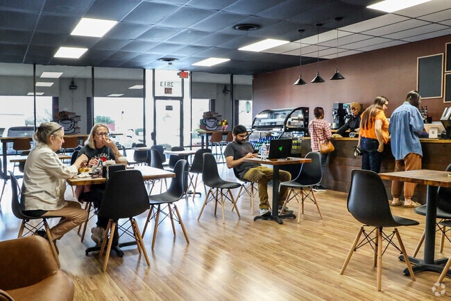 Residents of Bedford gather with friends and family at Coffee Tea & Books.