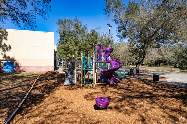 Kids enjoy the playground area at Copeland Park in University Hillsborough.
