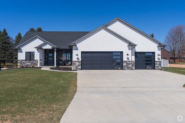 Custom new builds with modern farmhouse-inspired elements are common throughout Suamico.