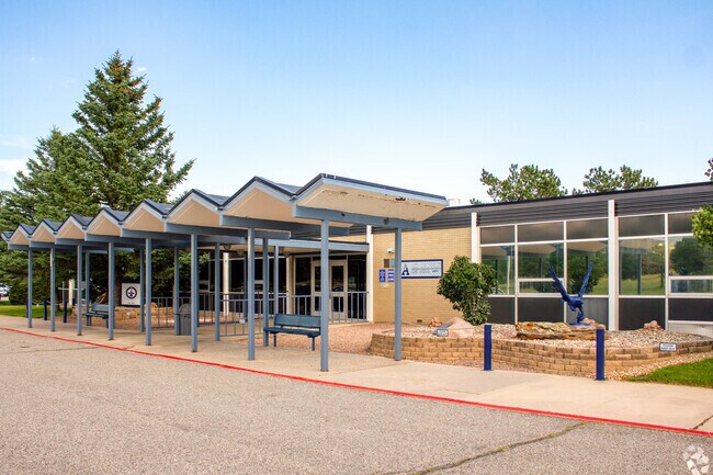 Air Academy High School's entrance has an awning to protect students from weather.