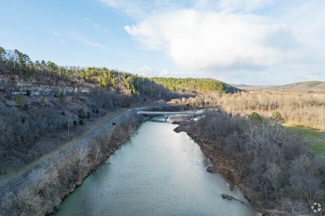An aerial view of the Illinois River in Tahlequah reveals its winding course through lush landscapes.