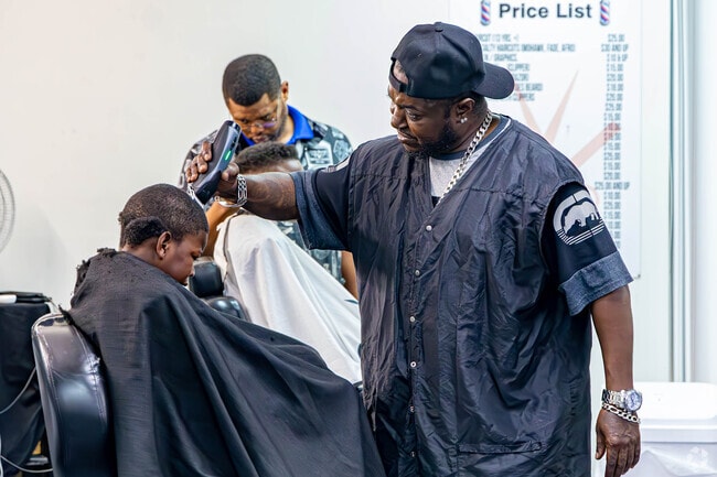 A kid is getting his very first haircut.