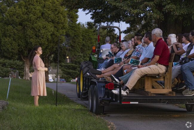 An actress portrays Aileen Minnich, a historical figure of the local area in Voices of Elmwood.