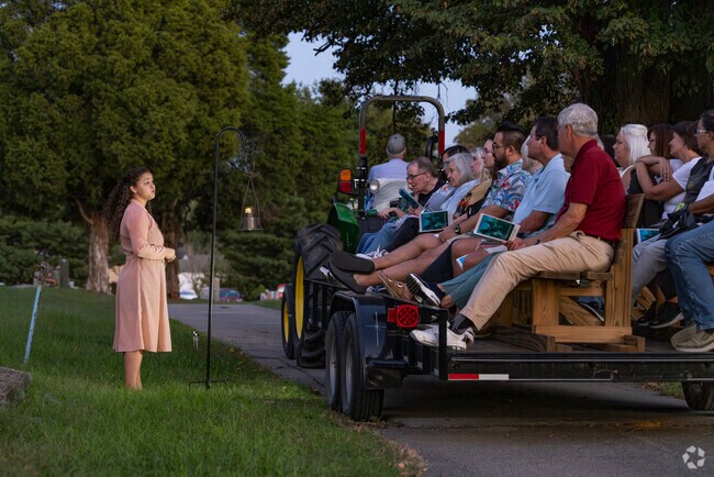 An actress portrays Aileen Minnich, a historical figure of the local area in Voices of Elmwood.