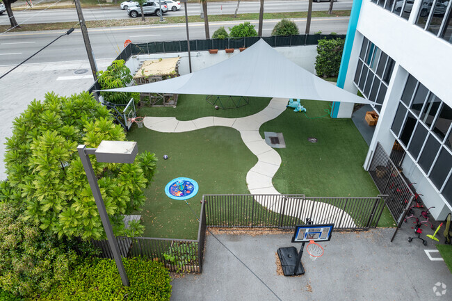 La Piazza School playground and walking path.