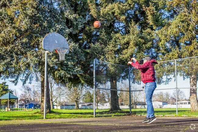 Join a basketball game at Royal Oaks Park.