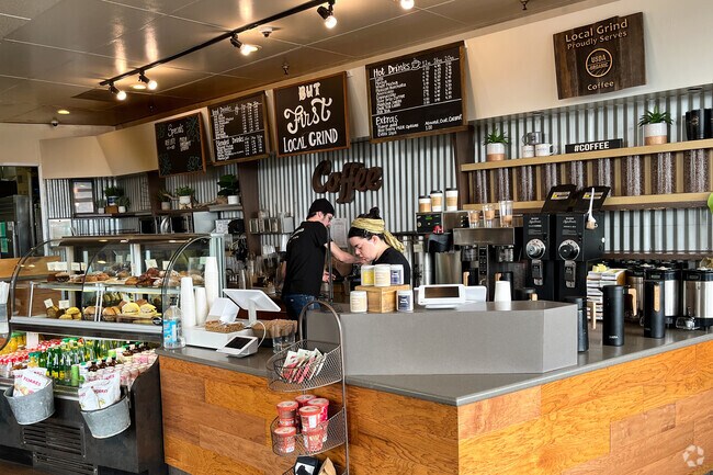 The baristas are busy at Local Grind on Spring Street.