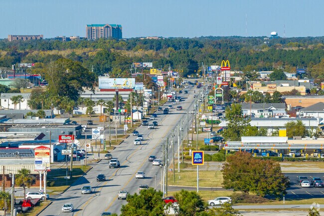 Highland Park sits between two primary retail and restaurant areas.