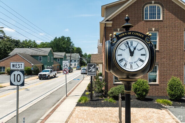A central clock stands as a local landmark on Main Street.