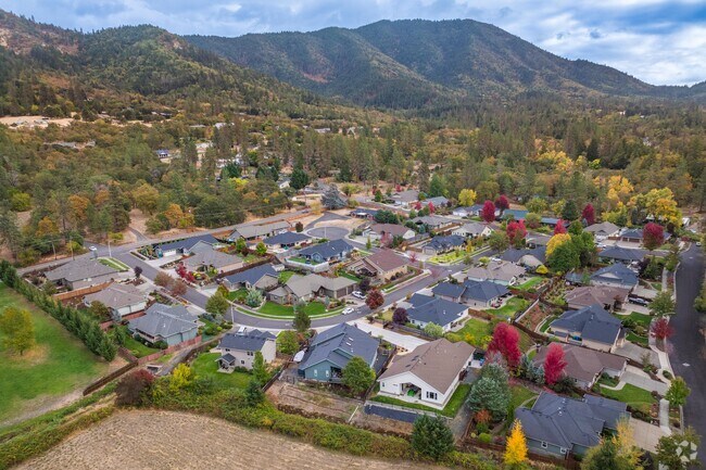 Single family homes in the Grace Garden Estates subdivision has Tree-covered hill scenery.