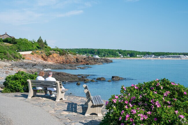 Visitors take a break at Marginal Way to take in Ogunquit's amazing coastal views.