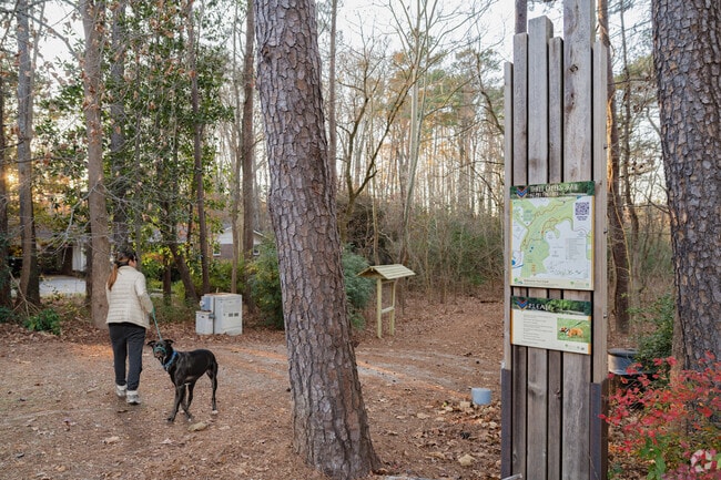 Three Creeks Trail offers a preserved woodland walking area for residents in Leafmore-Creek Park Hill.