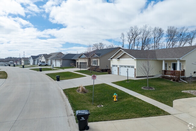 Saylorville features streets of beautifully manicured suburban landscape.