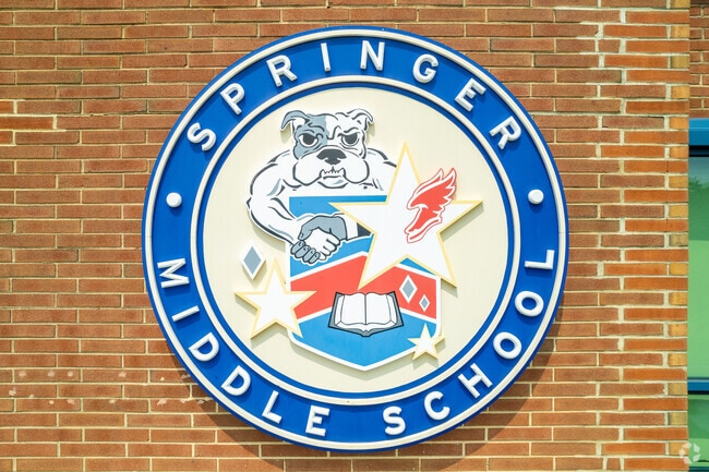 The Springer Middle School crest is displayed proudly on the side of the school.