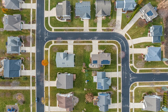 Aerial views highlight the modern homes and spacious lots in Cottage Grove.