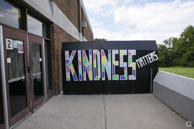 Kindness Matters artwork outside of front entrance of school