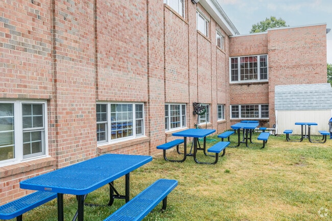 Outdoor picnic tables are accessible for eating at Calvary Road Christian School.