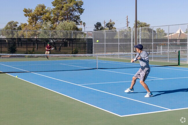 Work up a sweat playing tennis at Arrowhead Meadows Park in Chandler, Arizona.