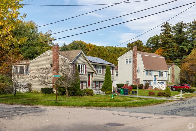 Homes in Southwest Nashua, NH are adorned with brick chimneys.