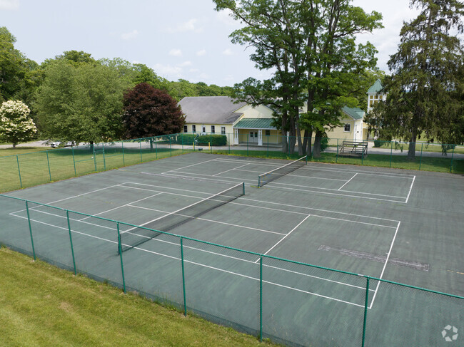 The facilities include academic buildings, dormitories, a library, a technology center, gym.