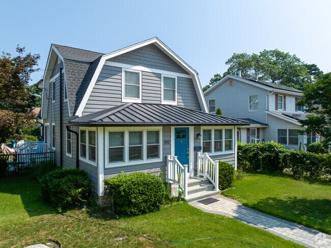 Small dutch colonial style homes are dotted throughout the town of West Belmar.