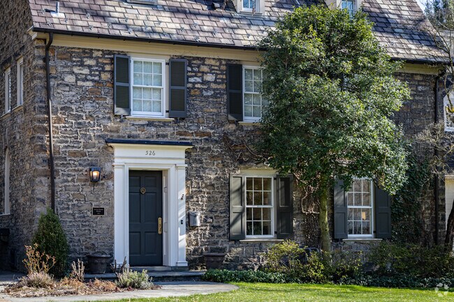 An old stone house sits on a beautiful plot of land in central Edgeworth.