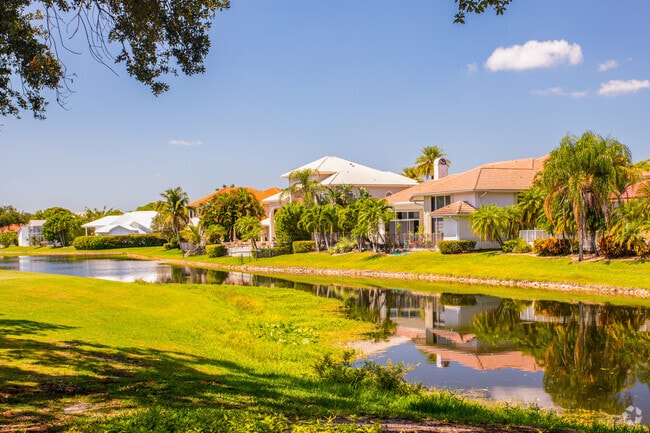 Wake up to a peaceful morning in a new waterfront Mediterranean home at Eagle Trace.