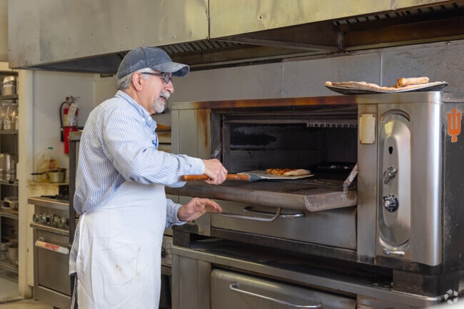 Lacopo's Pizza is a local institution and favorite pizzeria of Portage Crossing residents.