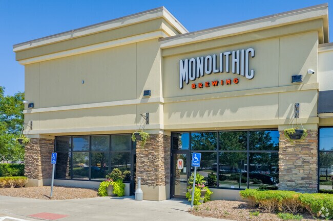 Monolithic Brewing pours small‑batch beers with lake views near the neighborhood.