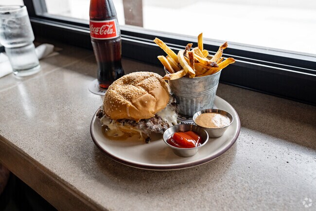 Grab a smash burger after a long day at Wagon Wheel Brewing Company in nearby South Bank.