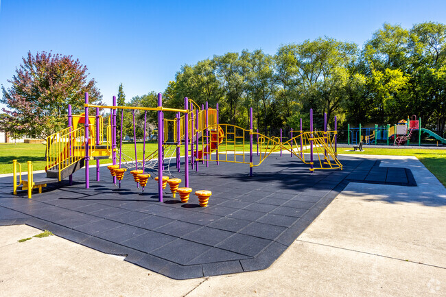 Students enjoy the playground at Hillis Elementary School in Merle Hay, IA.