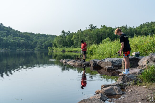 You will often see people fishing at Chambers Grove Park in Fond Du Lac.