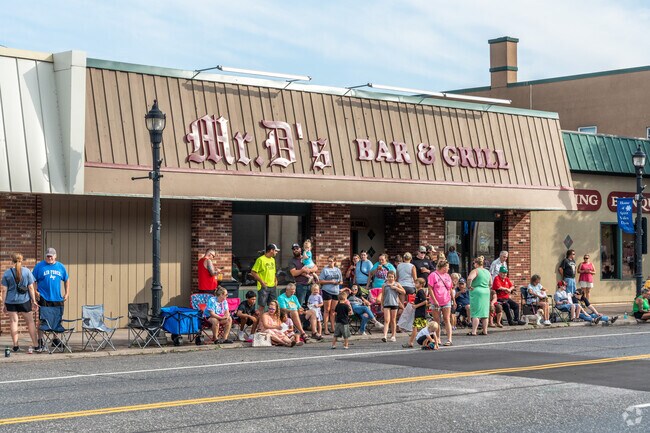 A crowd forms in front of Mr. D's Bar and Grill near Irving during Spirit Valley Days.