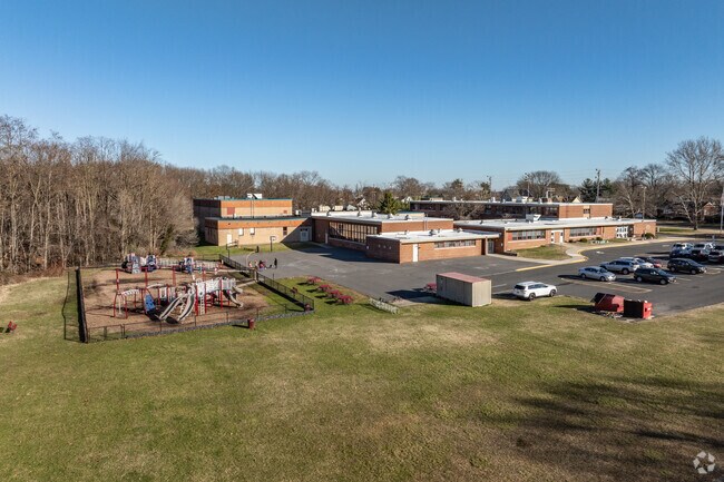 Cliffwood Elementary School's playground and rear entrance.
