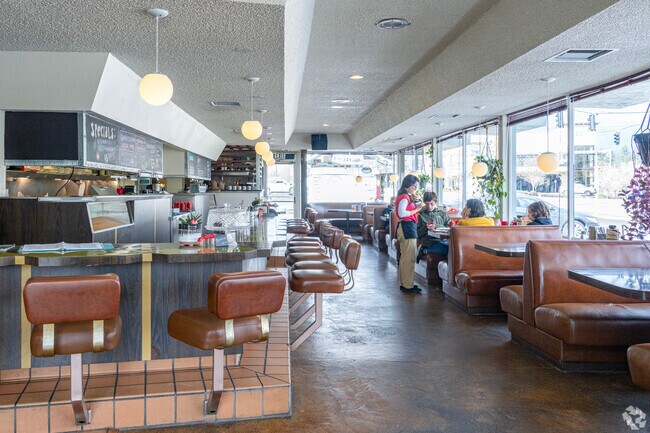 Grab breakfast in the classic Mid-Century Vertical Diner in the Hillsdale neighborhood.