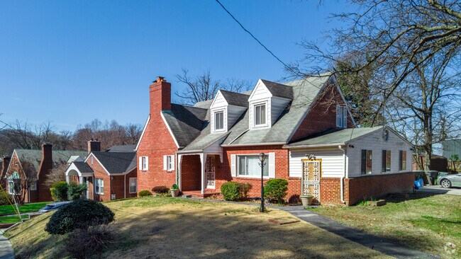 A large brick Cape Cod-style home in the Dupont Park neighborhood of DC.