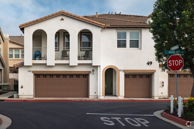 A townhome with Spanish-inspired arches is found in a community in Rancho Highlands.