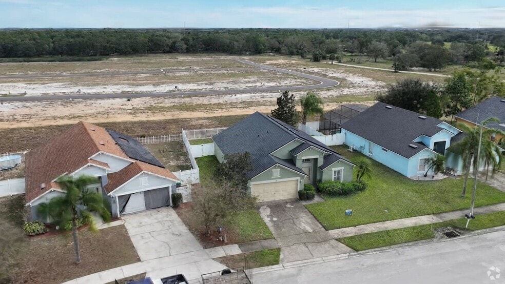 128 Argyle Gate Loop Rd, Dundee, FL 33838 - photo 2