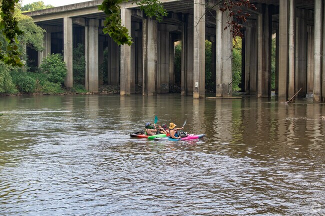 Kayakers enjoying the Chattahoochee river at Rottenwood Creek Trail in Vinings.
